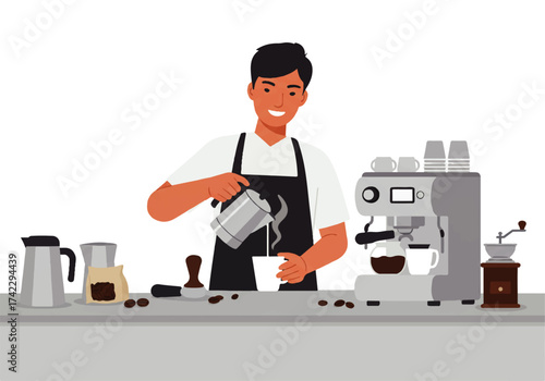 Smiling barista in apron pours milk from a stainless steel pitcher into a white cup of coffee, with an espresso machine and coffee beans on the counter.