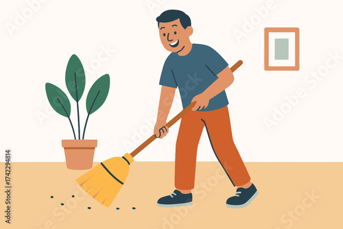 A young man sweeps the floor with a broom in a modern apartment, illustrating home cleaning and household maintenance.