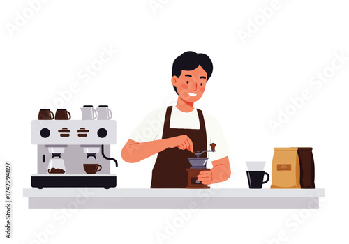 A barista grinds coffee beans with a manual grinder next to an espresso machine in a cafe setting.
