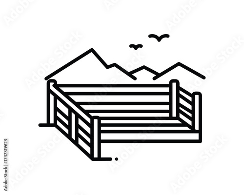Corral in mountainous landscape