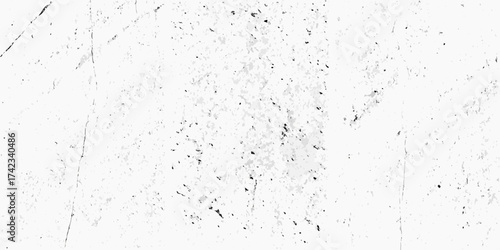 Abstract monochrome textured background with subtle cracks and speckled imperfections