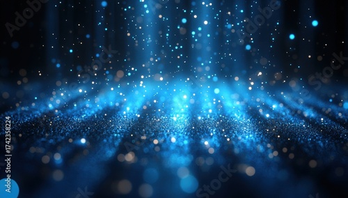 A mesmerizing blue scene featuring sparkling particles, resembling a dreamy atmosphere filled with light and movement.