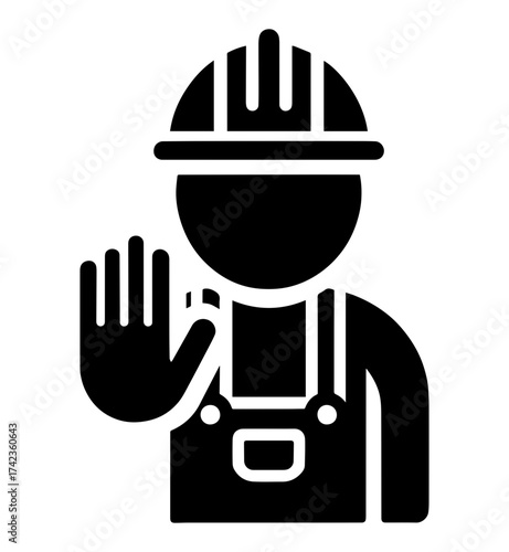 Wallpaper Mural A silhouette of a construction worker with a raised hand in a stop gesture Torontodigital.ca