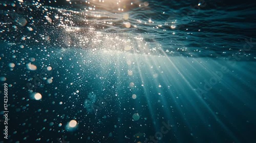 Sunlight Rays Underwater – Dreamy Blue Ocean Scene in 4K