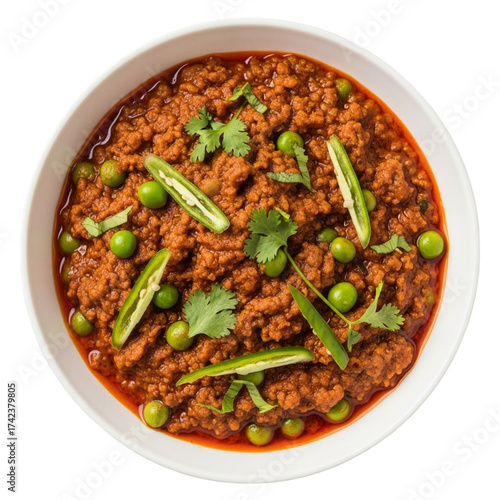 Delicious indian keema matar served in a white bowl with black background