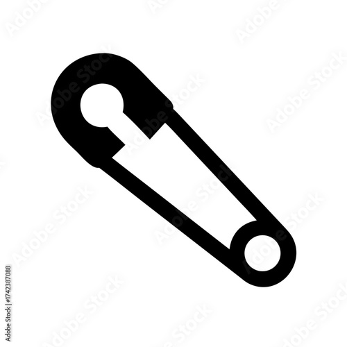 A close up macro shot of a single dewdrop glistening on a vibrant green blade of grass in soft morning light