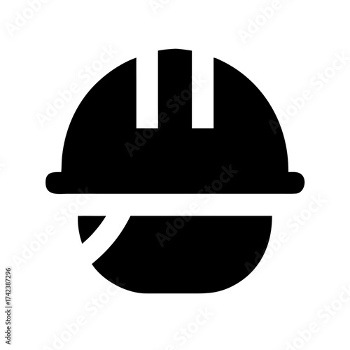 A single black cat with bright green eyes sits calmly on a dark background looking directly at the camera with intense focus