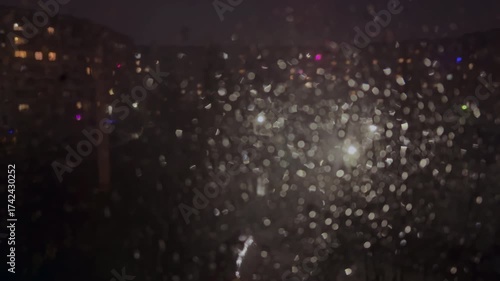 Rain drops on glass. Behind the Glass Night City.