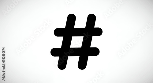 A simple rendering of a black hashtag symbol on a clean white background graphic element for