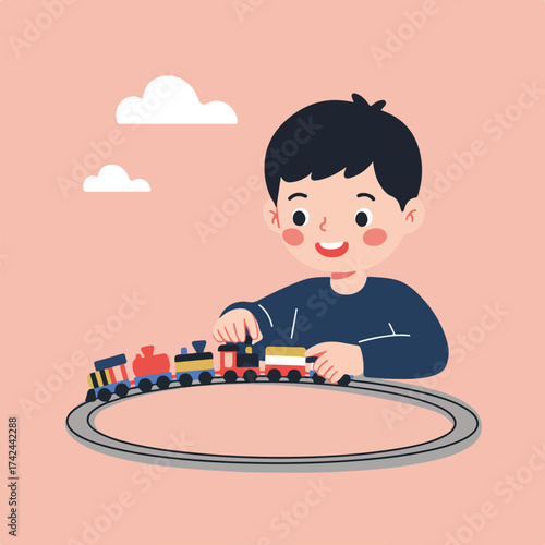 Boy happily playing with colorful toy train on tracks