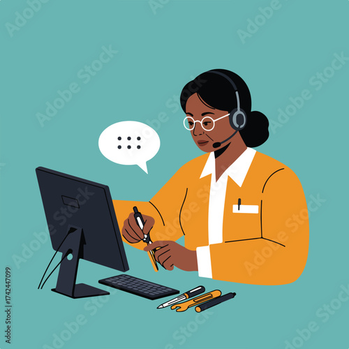 Person wearing headset and glasses works at computer, with communication bubble