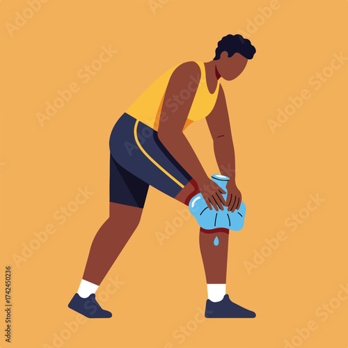 Person applying cold compress to injured knee with athletic wear
