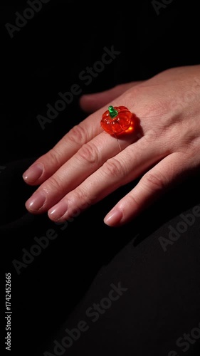 Wearing Halloween Pumpkin Ring That Lights up on Finger