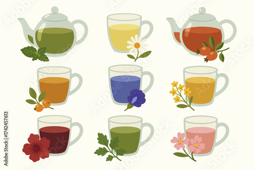 Variety of herbal teas with colorful flowers and greenery in teacups and teapots