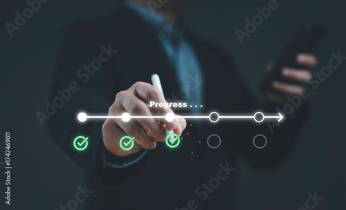 Businessman hand drawing progress timeline with checklist icons symbolizing project management workflow milestones business success planning strategy and digital growth