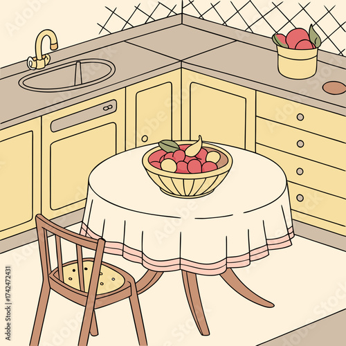 Cozy kitchen corner with a round table covered with a tablecloth and a bowl of fruit