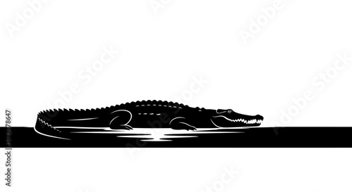 Alligator or Crocodile Silhouette in Water.