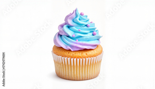 Colorful cupcake with pink and blue frosting and decorative sprinkles on a light background