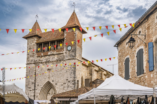Landscape view of the facade of ancient Notre Dame church in medieval Villereal town, Lot-et-Garonne, France