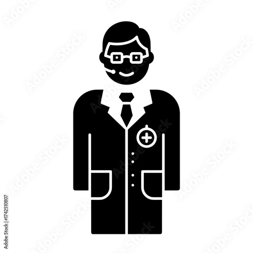 Male doctor in white coat smiling to celebrate International Doctor's Day  