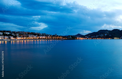 Blue hour, dusk, on La Concha beach in San Sebastian, Spain