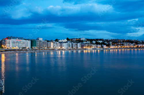Blue hour, dusk, on La Concha beach in San Sebastian, Spain