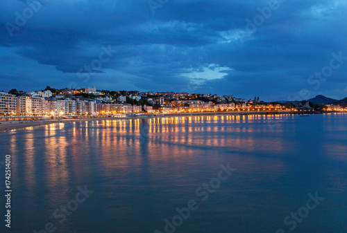 Blue hour, dusk, on La Concha beach in San Sebastian, Spain