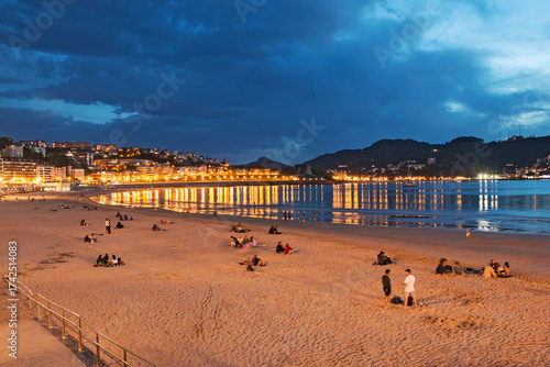 Blue hour, dusk, on La Concha beach in San Sebastian, Spain