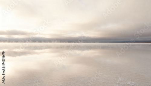 Ethereal White Lake Under Overcast Sky Reflections on Water Surface Landscape