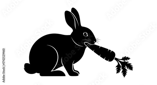 Black rabbit with carrot in mouth, a simple silhouette illustration.