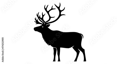 Majestic Silhouette - A Powerful Caribou Standing Tall.