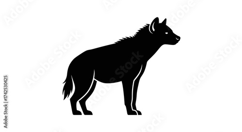 Silhouette of a hyena standing profile view black and white.