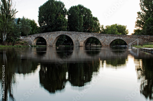 Ancient Romanesque bridge in a village in Spain