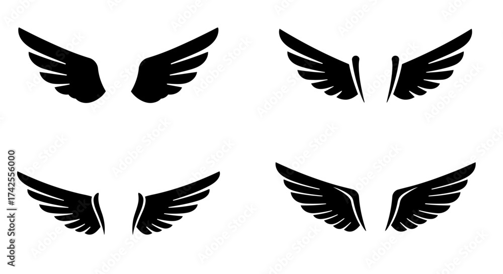 Fototapeta premium A collection of four black wing silhouettes against a white background