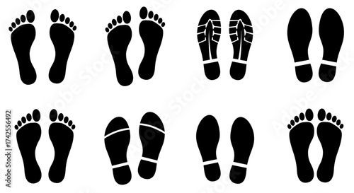 A collection of varied black footprints on a plain white background