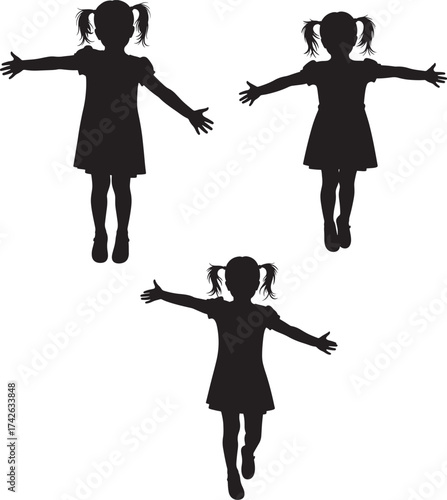 Three happy girls in silhouette with arms outstretched silhouette