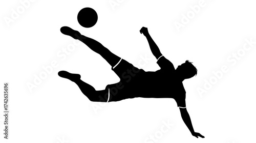 Dynamic soccer player executes a powerful aerial kick, capturing peak athletic performance and game intensity in a striking silhouette