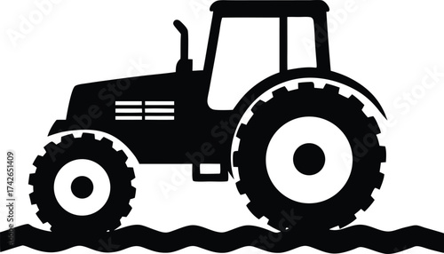 a tractor plowing a field  simple side view