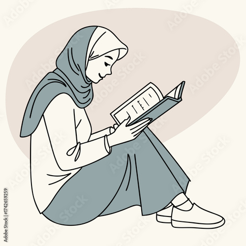 Muslim woman reading a book while sitting on the floor