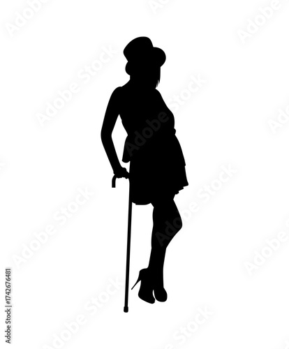 Elegant silhouette of a woman in a hat and heels leaning on a cane