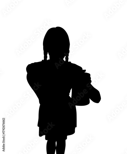 Silhouette of a young girl holding a stuffed animal against a bright white background