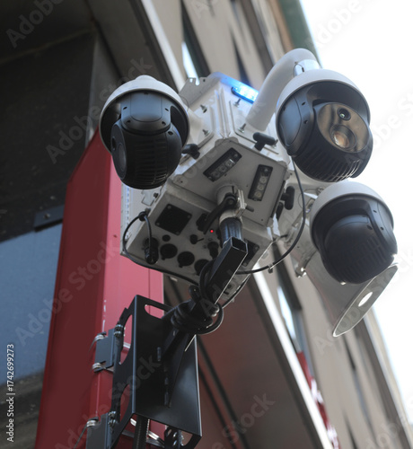 surveillance cameras monitoring city people linked to police center