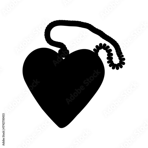 Silhouette of a heartshaped pendant necklace on a plain white background