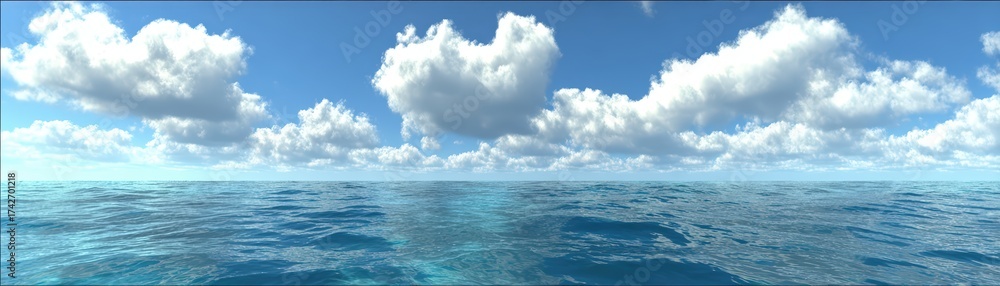 Fototapeta premium Beautiful panoramic view features soft white clouds floating above sparkling blue ocean waters stretching to the distant horizon on a sunny day.