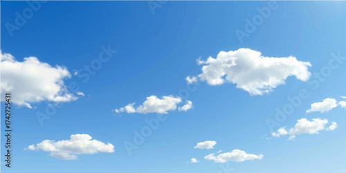 Beautiful summer day with bright blue sky and fluffy white clouds