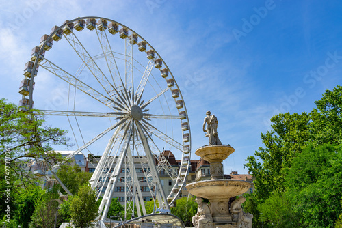 Ferris Wheel of Budapest and Danubius Fountain