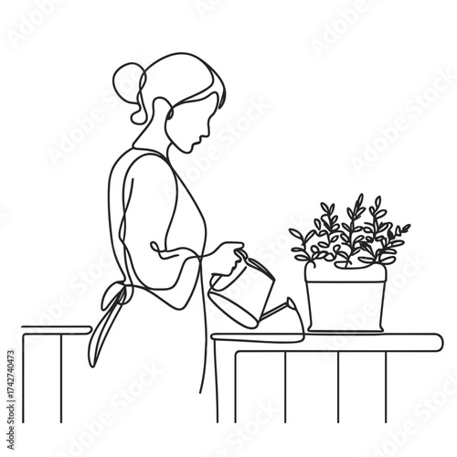 Woman planting balcony herbs while watering potted plant indoors  