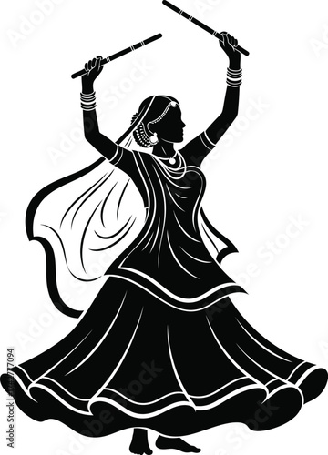 Silhouette of a woman performing garba dance with dandiya sticks during navratri festival celebration