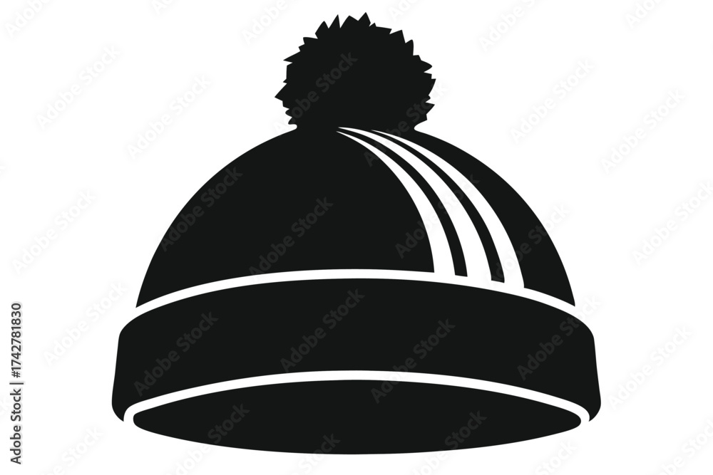 Fototapeta premium Black and white winter hat has a pompom on top and striped accents