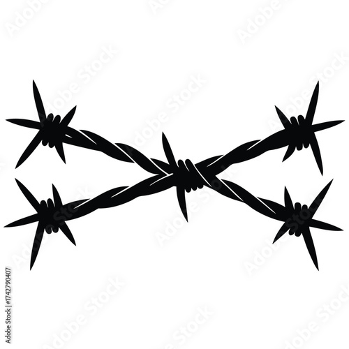 Intersecting black barbed wire creates sharp points, evoking danger and caution in silhouette